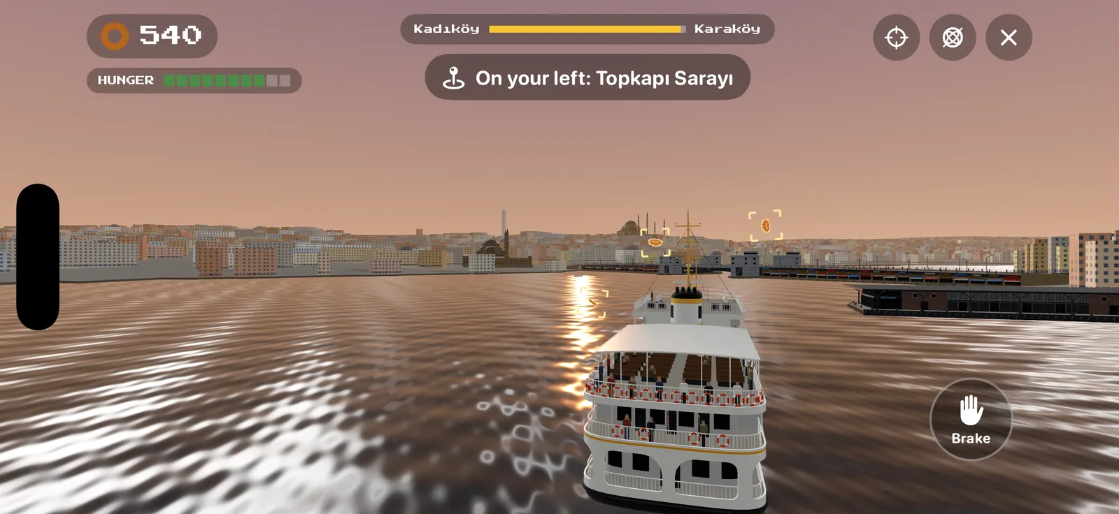 Istangull gameplay at sunset: Susam follows a white ferry towards Karaköy, a simit in the air, the Historic Peninsula on the horizon and a guide reading “On your left: Topkapı Sarayı”.
